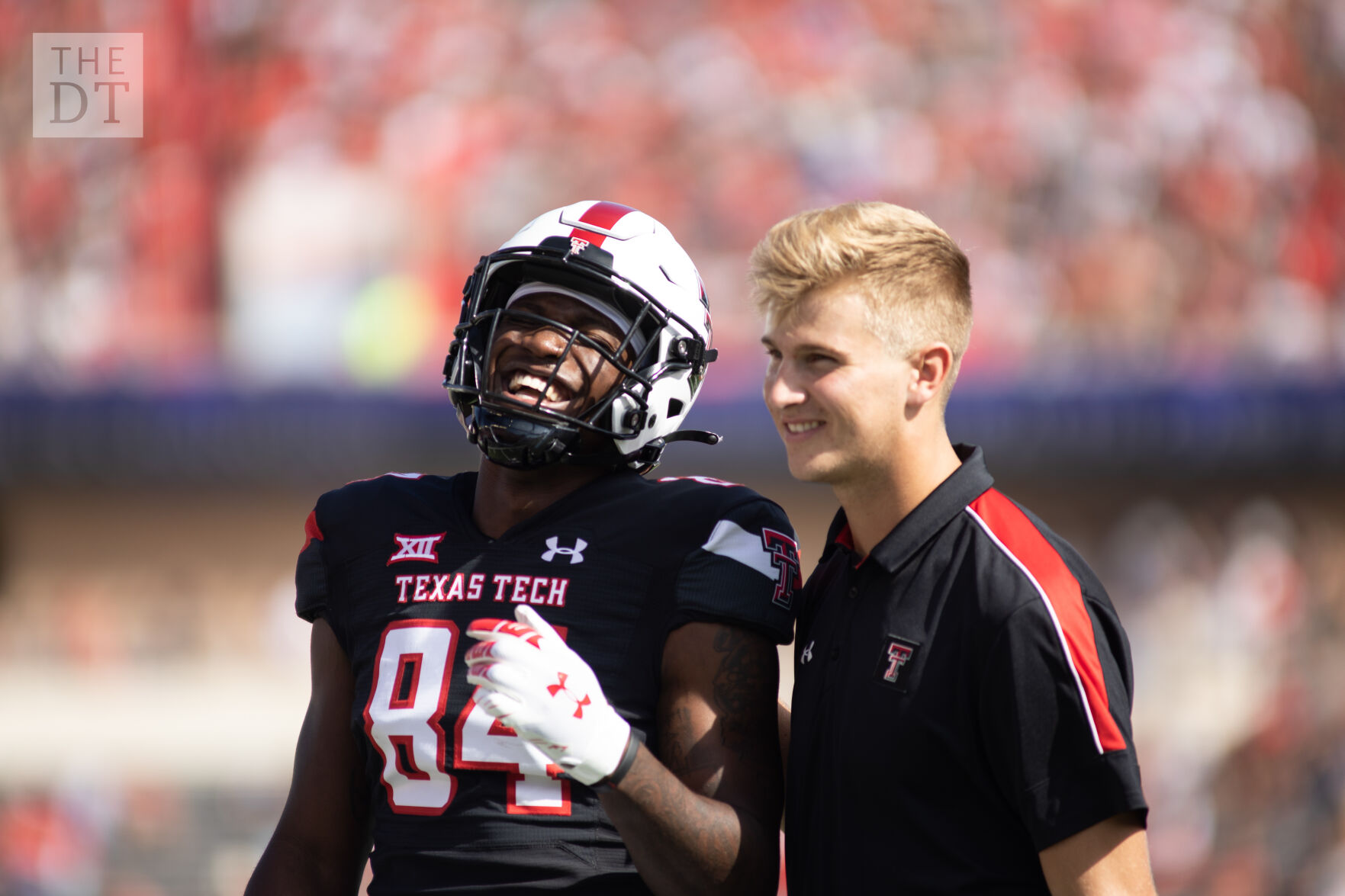 J.J. Sparkman and Tyler Shough walk off the field